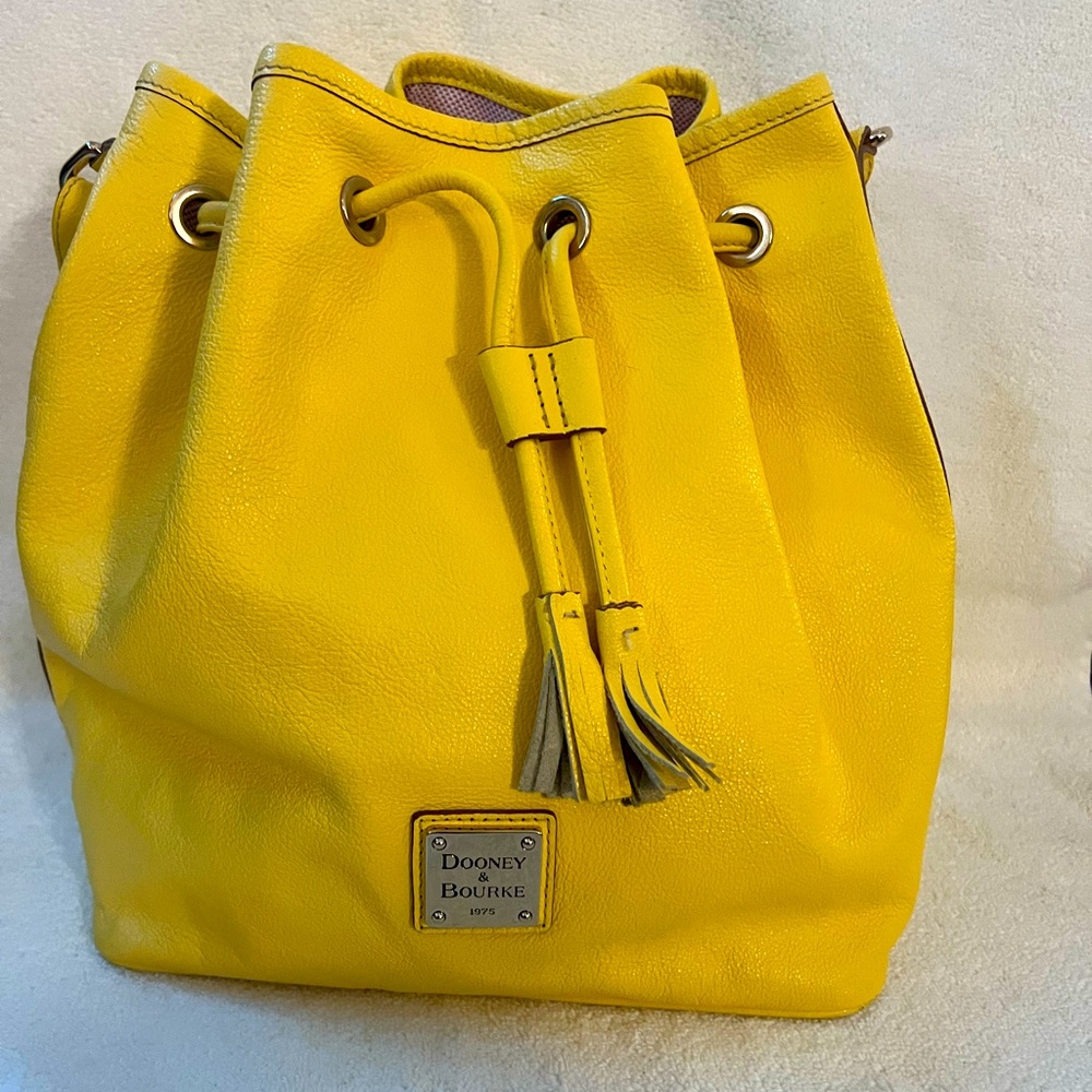 Dooney and Bourke pebble grain drawstring shoulder bag